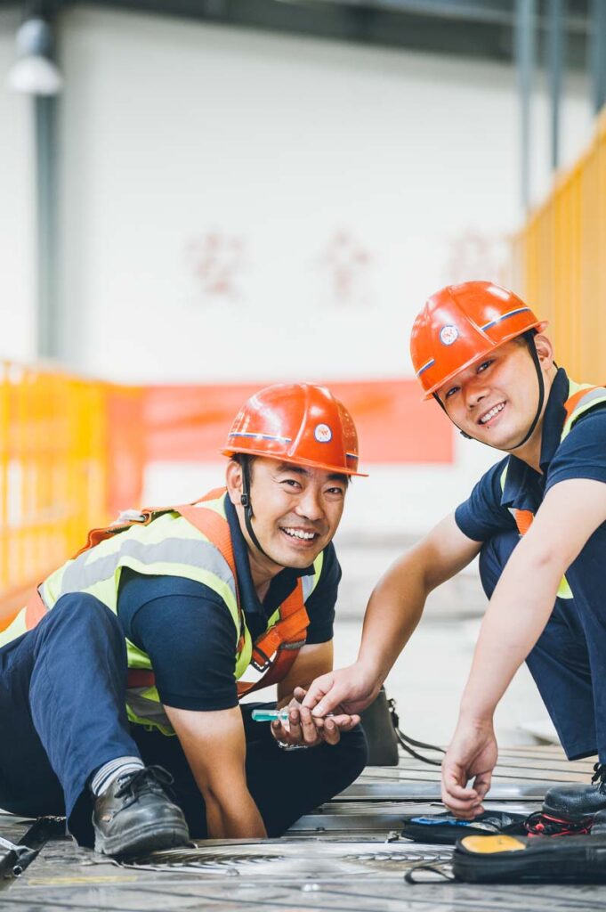 AirCondition Service Arbeiter in China – Industriefoto